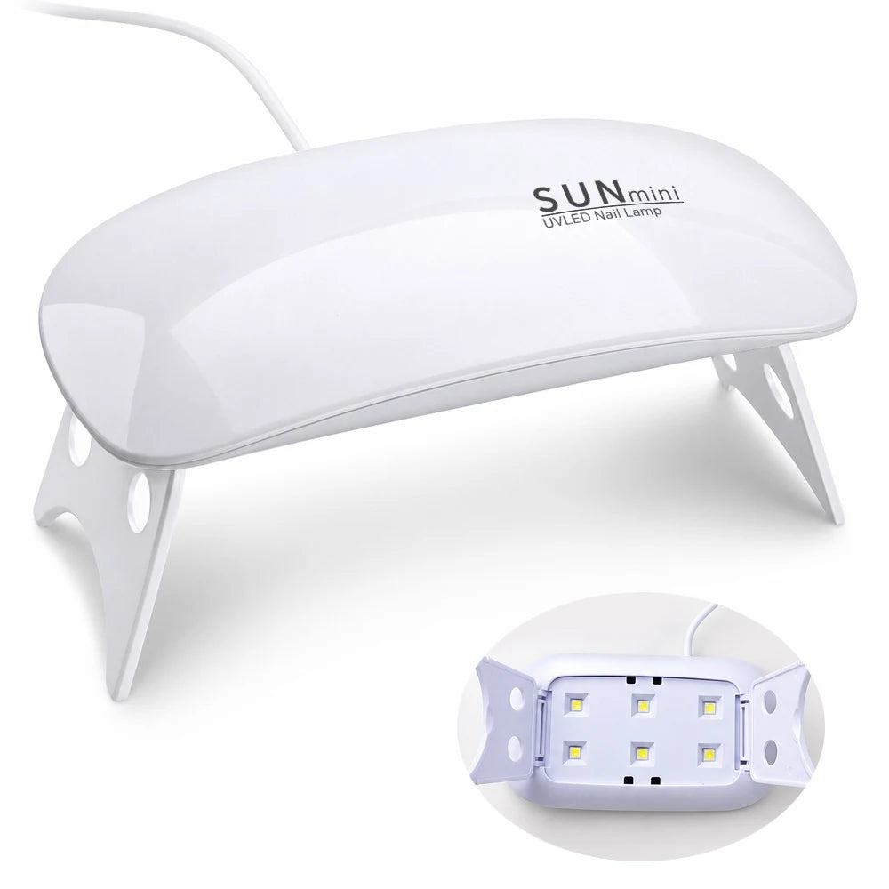White foldable USB nail lamp with cord folded flat